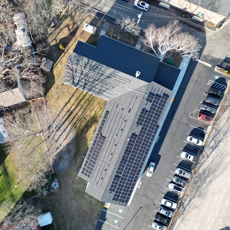 Commercial Solar Installation attached to asphalt roof