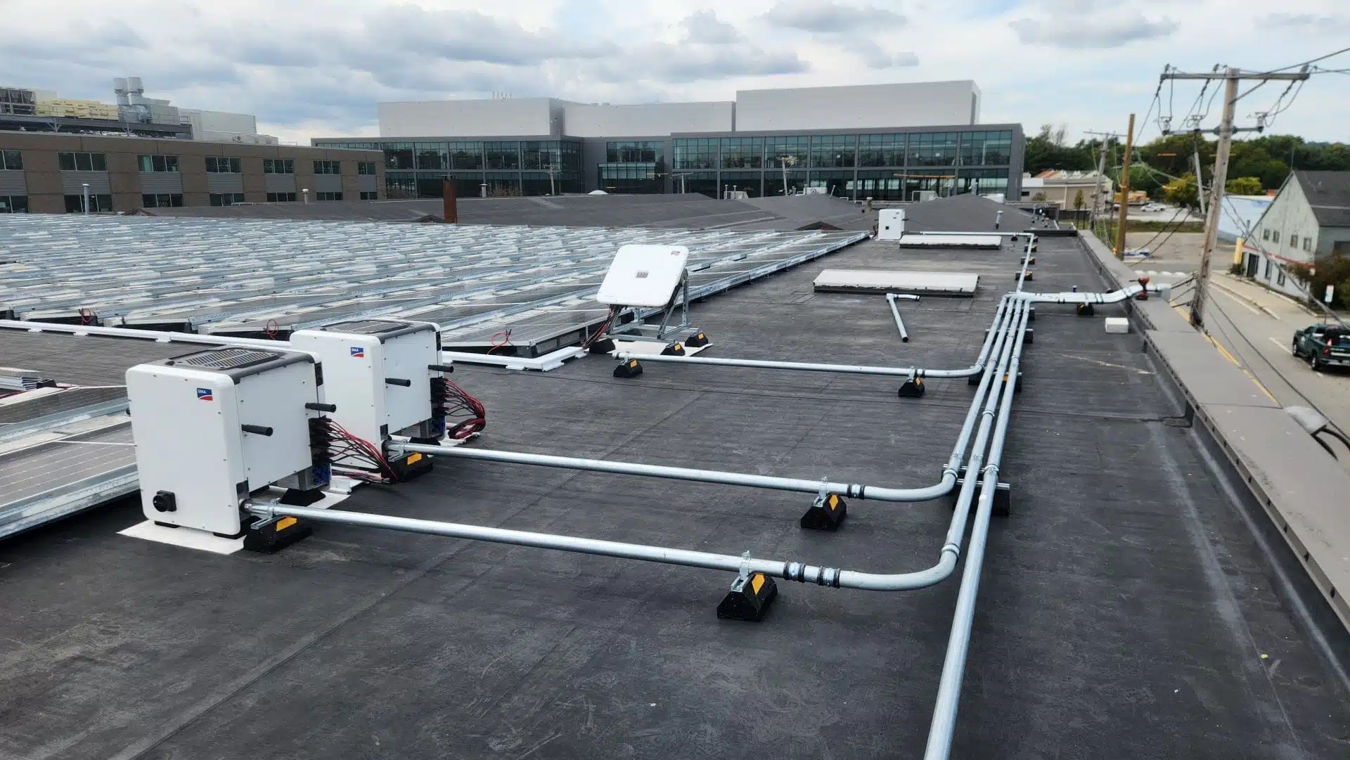 Inverters and conduit mounted on the roof