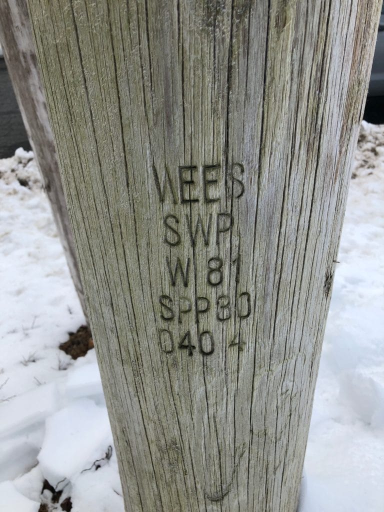 Telephone pole with numbers