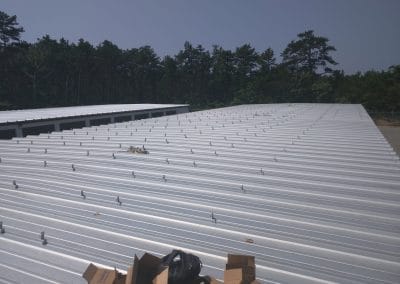 Photo of a field of L-feet installed on the rooftop