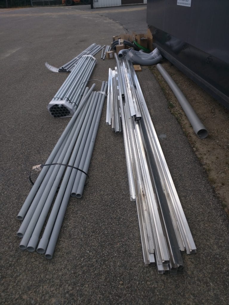 Bundled PVC conduit and aluminum extrusions