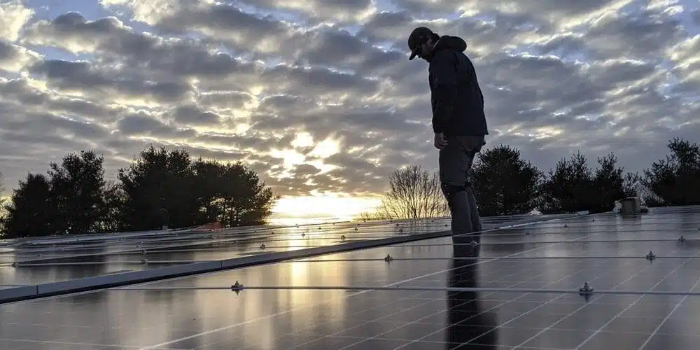 Man Standing on Roof