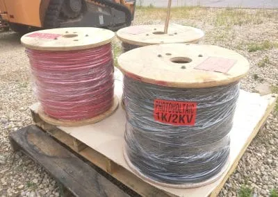 Spools of wire delivered to the site
