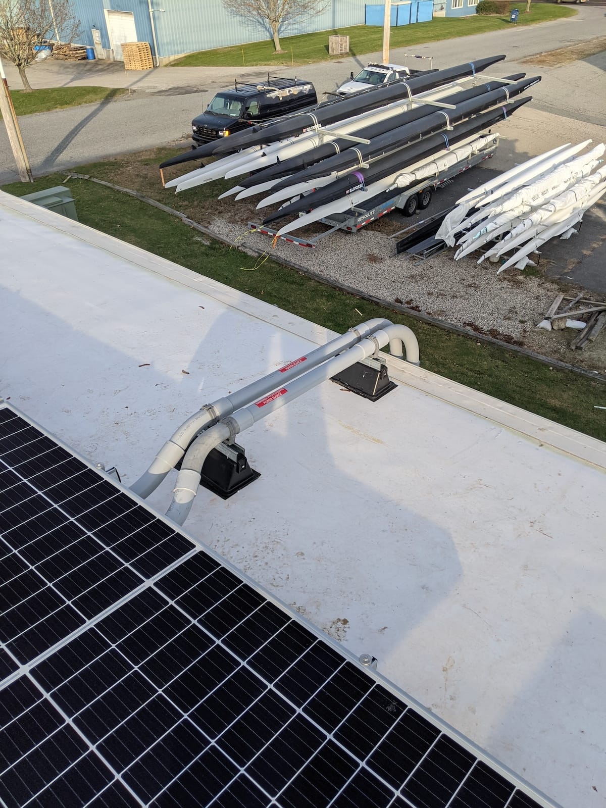 Conduit carries electricity off roof to inverters and switchgear