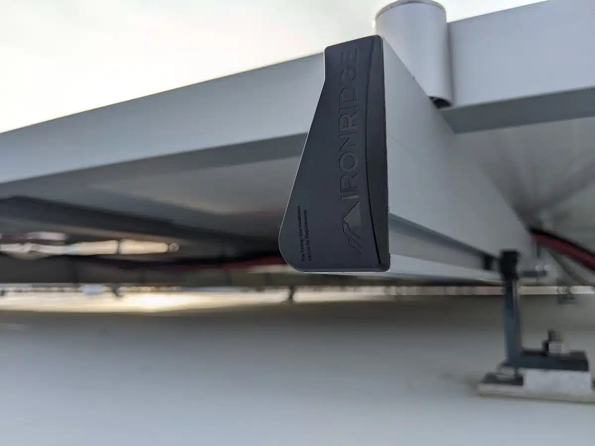 Clean black cap at end of extruded support rail