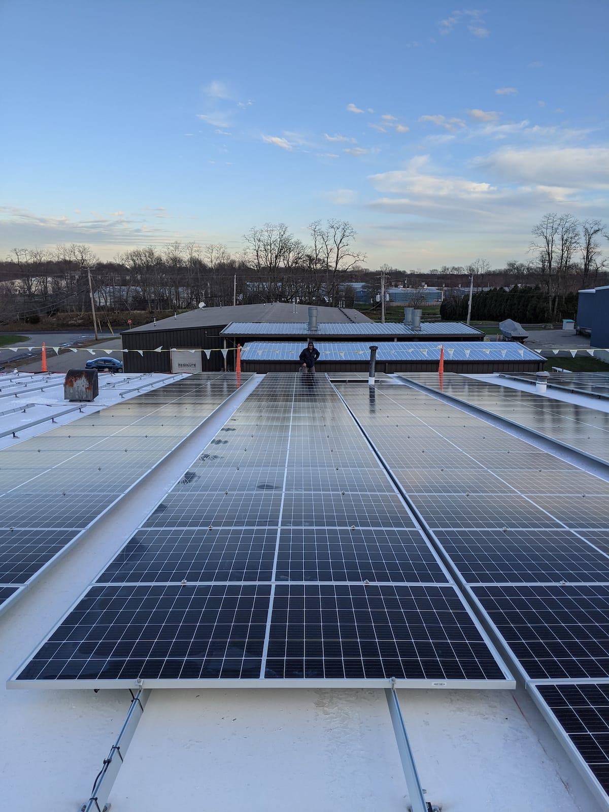 Panels neatly laid out, attaching to racking